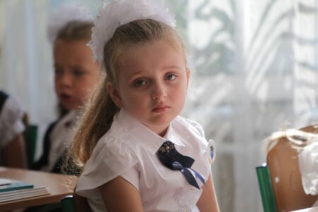 ODESSA UKRAINE - September 1, 2019: First call. 1 September is Day of Knowledge. Solemn school line, first grade, back to school. School holiday Knowledge Day. Little schoolchildren, first gradersのeditorial素材