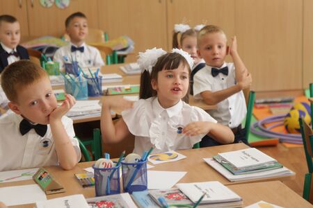 ODESSA UKRAINE - September 1, 2019: First call. 1 September is Day of Knowledge. Solemn school line, first grade, back to school. School holiday Knowledge Day. Little schoolchildren, first gradersのeditorial素材