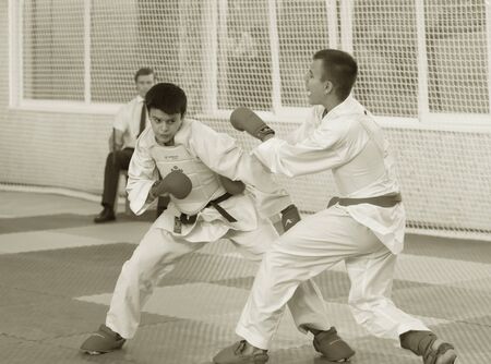 Odessa, Ukraine - September 30, 2019: Karate Championship among children of athletes. Best karate fighters from demonstrate their ability to fight obscenities. Battle of young karate cadetsのeditorial素材