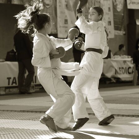 Odessa, Ukraine - September 30, 2019: Karate Championship among children of athletes. Best karate fighters from demonstrate their ability to fight obscenities. Battle of young karate cadetsのeditorial素材