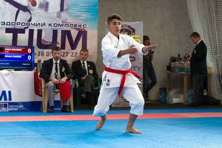 Odessa, Ukraine - September 30, 2019: Karate Championship among children of athletes. Best karate fighters from demonstrate their ability to fight obscenities. Battle of young karate cadetsのeditorial素材