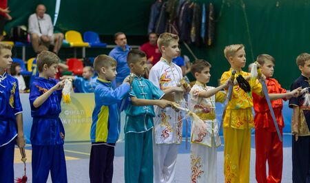 ODESSA, UKRAINE - October 1, 2019: Wushu athlete during the Wushu competition among children. Young...