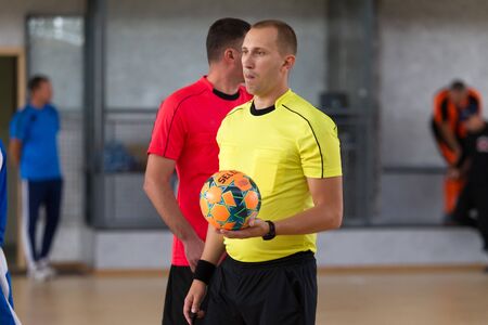 Odessa, Ukraine - October 6, 2019: Unidentified local team players play indoor soccer futsal...