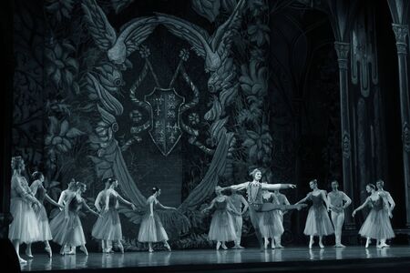 ODESSA, UKRAINE -JULY22, 2019: ballet. Classical ballet on stage of Odessa Opera Theater. Ballet dancers on stage dance classical works of Swan Lake. Form of artistic ball dance on stage of theaterのeditorial素材