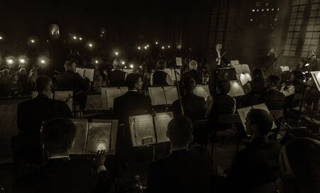 ODESSA, UKRAINE - October 15, 2019: Spectators at a concert in the theater enjoy a performance of the popular NAOMI national instrument orchestraのeditorial素材