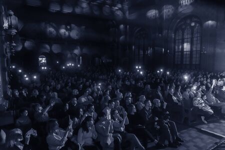 ODESSA, UKRAINE - October 15, 2019: Spectators at a concert in the theater enjoy a performance of the popular NAOMI national instrument orchestraのeditorial素材
