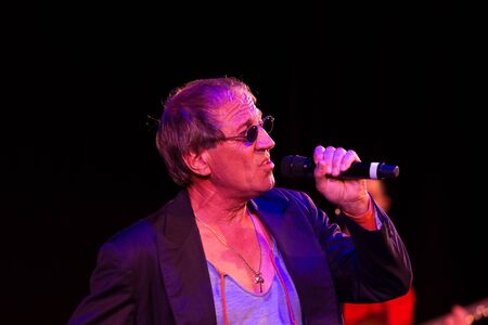 ODESSA, UKRAINE - Nov. 1, 2019: concert performance by Adriano Celentano. Soloist of the music group - Adolfo Sebastiani - famous singer, showman Celentano. Tribute Show Celentano. Italian pop legendのeditorial素材