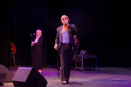 ODESSA, UKRAINE - Nov. 1, 2019: concert performance by Adriano Celentano. Soloist of the music group - Adolfo Sebastiani - famous singer, showman Celentano. Tribute Show Celentano. Italian pop legendのeditorial素材