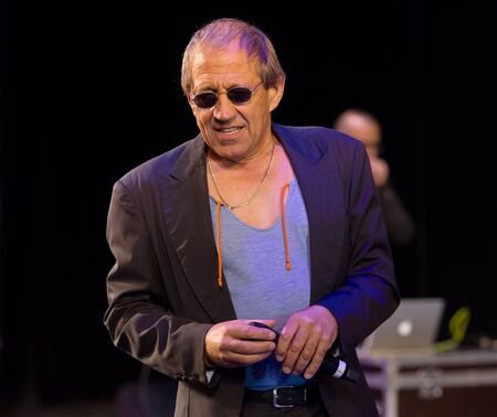 ODESSA, UKRAINE - Nov. 1, 2019: concert performance by Adriano Celentano. Soloist of the music group - Adolfo Sebastiani - famous singer, showman Celentano. Tribute Show Celentano. Italian pop legendのeditorial素材