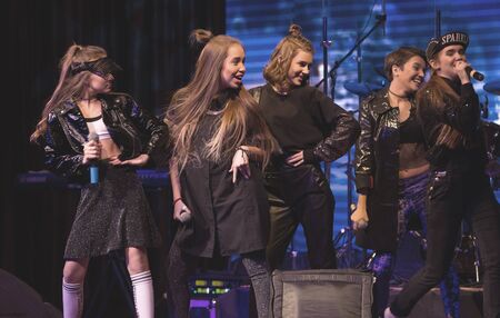 ODESSA, UKRAINE January 1, 2017: Open Girl, a children's music group, sings and dances on stage....