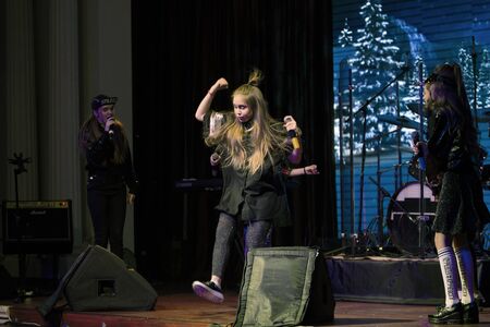 ODESSA, UKRAINE January 1, 2017: Open Girl, a children's music group, sings and dances on stage....