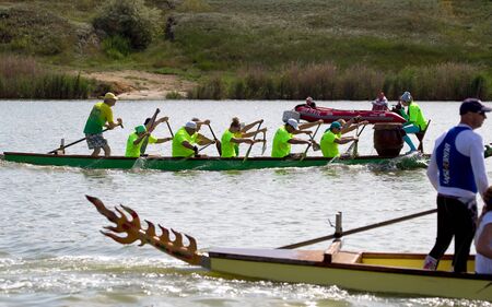 ODESSA, UKRAINE - July 1, 2019: Dragon Boat Festival. Dragon Boat Festival in the river. Dragon boat competitions on the day of the city. 17 international teamsのeditorial素材