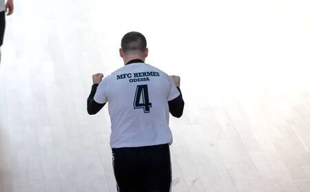 ODESSA, UKRAINE - CIRKA, 202020: Unidentified local team players play futsal futsal tournament on...