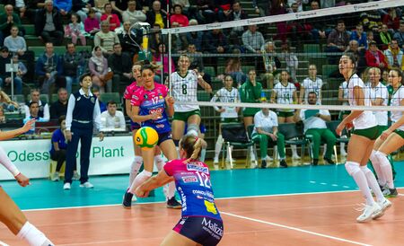 ODESSA, Yuzhny, UKRAINE - Febr 4, 2020. Women European Volleyball Championship. VK Khimik - Ukraine accepts Igor Gorgonzola NOVARA, Italy (red-blue). CEV Cup Challendge round European Women Volleyballのeditorial素材