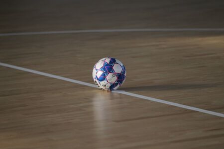 Odessa, Ukraine-December 12, 2019: Little boys, children play mini football in sports hall at sports city Junior championship. Children's sport is healthy lifestyle. Sports children football playersのeditorial素材