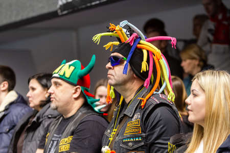 KAMENSKY, Ukraine - February 14, 2020. Sports spectators, fans do not support their team during...