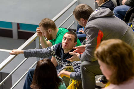 KAMENSKY, Ukraine - February 14, 2020. Sports spectators, fans do not support their team during...