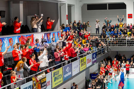 KAMENSKY, Ukraine - February 14, 2020. Sports spectators, fans do not support their team during women's volleyball tournament. Sports fans, ultras on grandstandのeditorial素材