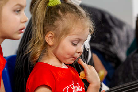 KAMENSKY, Ukraine - February 14, 2020. Sports spectators, fans do not support their team during women's volleyball tournament. Sports fans, ultras on grandstandのeditorial素材