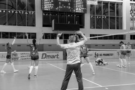 KAMENSKY, Ukraine-February 14, 2020. Ukrainian Volleyball Cup of Ukraine. Champion of Ukraine VC KHIMIK Yuzhny (green). Winning Women Volleyball Champions Game. Intense game of women's sportsのeditorial素材