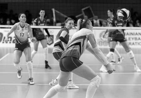 KAMENSKY, Ukraine-February 14, 2020. Ukrainian Volleyball Cup of Ukraine. Champion of Ukraine VC KHIMIK Yuzhny (green). Winning Women Volleyball Champions Game. Intense game of women's sportsのeditorial素材