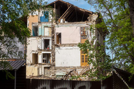 ODESSA, UKRAINE May 21, 2020: Historic residential building collapsed as result of mistakes in construction and reconstruction in old city. Bare wall Destruction of residential building. Catastropheのeditorial素材
