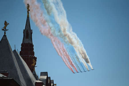 MOSCOW, RUSSIA - June 24, 2020: Victory Parade -75. Red Square. Aerial show in sky. Air parade...