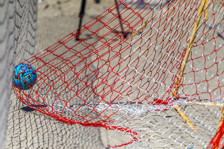 Odessa, Ukraine-July 25, 2020: Beach Soccer Championship among amateur women on beach. Soccer in sand. Young beautiful girls playing beach football on sand of city beach. Football on sandのeditorial素材