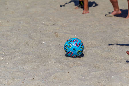 Odessa, Ukraine-July 25, 2020: Beach Soccer Championship among amateur women on beach. Soccer in sand. Young beautiful girls playing beach football on sand of city beach. Football on sandのeditorial素材