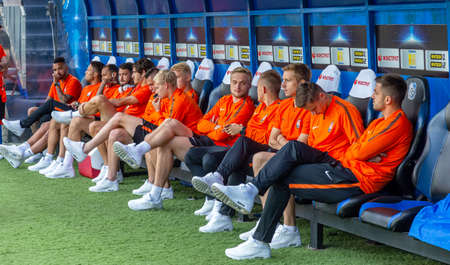 ODESSA, UKRAINE - 07/15/2018: Players of FC SHAKHTER Donetsk on the bench before the start of the UEFA Cup match against FC Dynamo Kiev. Footballers on the benchのeditorial素材