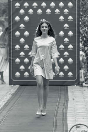 Odessa, Ukraine - CIRCA 2020: Children's Fashion Show. Presentation of young models in fashionable clothes on the red carpet defile. Models walk the runway at the presentation of the collectionのeditorial素材