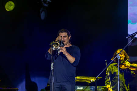 ODESSA, UKRAINE -25 August 2020: Famous violinist Vasily Popadyuk (Canada) and jazz band PAPA DUKE BAND on stage. Solo concert of a famous kripach and composer on the stage of the theaterのeditorial素材