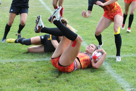 Odessa, Ukraine - August 22, 2020: Ukrainian Cup among women rugby teams Odessa. Tense moment of girls' rugby fight. Dramatic challenging game for women's rugby teamのeditorial素材