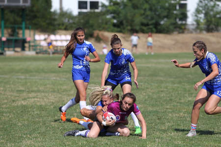Odessa, Ukraine - August 22, 2020: Ukrainian Cup among women rugby teams Odessa. Tense moment of girls' rugby fight. Dramatic challenging game for women's rugby teamのeditorial素材