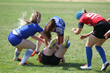 Odessa, Ukraine - August 22, 2020: Ukrainian Cup among women rugby teams Odessa. Tense moment of girls' rugby fight. Dramatic challenging game for women's rugby teamのeditorial素材