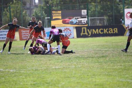 Odessa, Ukraine - August 22, 2020: Ukrainian Cup among women rugby teams Odessa. Tense moment of girls' rugby fight. Dramatic challenging game for women's rugby teamのeditorial素材