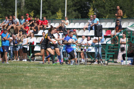 Odessa, Ukraine - August 22, 2020: Ukrainian Cup among women rugby teams Odessa. Tense moment of girls' rugby fight. Dramatic challenging game for women's rugby teamのeditorial素材