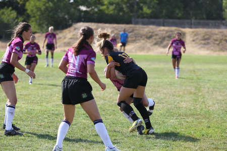 Odessa, Ukraine - August 22, 2020: Ukrainian Cup among women rugby teams Odessa. Tense moment of girls' rugby fight. Dramatic challenging game for women's rugby teamのeditorial素材