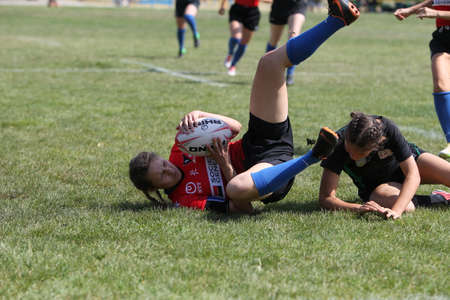 Odessa, Ukraine - August 22, 2020: Ukrainian Cup among women rugby teams Odessa. Tense moment of girls' rugby fight. Dramatic challenging game for women's rugby teamのeditorial素材
