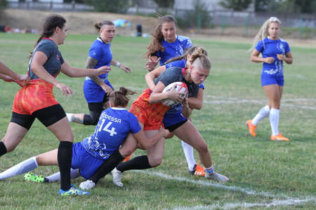 Odessa, Ukraine - August 22, 2020: Ukrainian Cup among women rugby teams Odessa. Tense moment of girls' rugby fight. Dramatic challenging game for women's rugby teamのeditorial素材