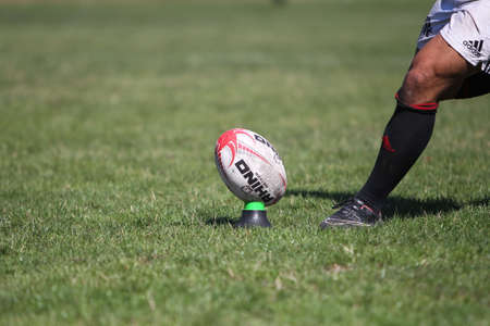 ODESSA, UKRAINE - SEPTEMBER 12, 2020: Final games of strongest rugby-7 teams in Ukrainian championship. Rugby ball on field. Rugby match is tough fight for ball. Athletes team players on fieldのeditorial素材