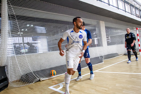 ODESSA, UKRAINE - 11/28/2020: MFC PRODEXIM (UKR) FUTSAL Champions League (Kherson) -white- ROSARIO (Northern Ireland) -blue. Highlights. PRODEXIM 28-1 Rosario Futsal Club. Mini-football on parquetのeditorial素材