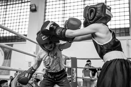 Odessa, Ukraine, May 15, 2021: Boxing tournaments among children. Children's boxing, children's sports. Children struggle with these adult emotions. Popularization of sports and a healthy lifestyleのeditorial素材