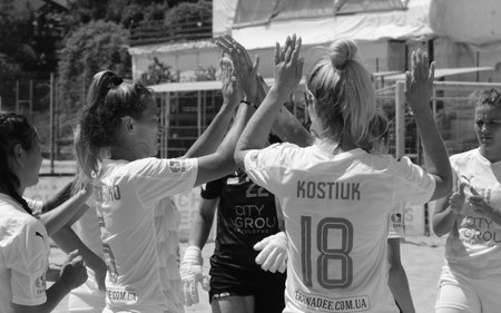 ODESSA, UKRAINE July 8, 2021: Ukrainian Beach Soccer Women's Cup. The girl's footballers are desperately playing beach soccer on sand of sea city beach on a hot sunny day. Women's soccer on sandのeditorial素材