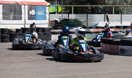 ODESSA, UKRAINE - August 7,2022: Extreme car racing. healthy lifestyle. Tense moments of race. People are into motorsports. Karting. Hobbies, sport, recreation, lifestyle. Risk and excitement on courtのeditorial素材