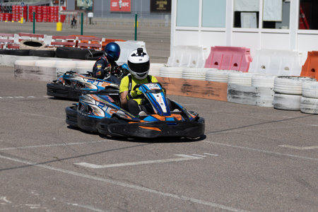 ODESSA, UKRAINE - August 7,2022: Extreme car racing. healthy lifestyle. Tense moments of race. People are into motorsports. Karting. Hobbies, sport, recreation, lifestyle. Risk and excitement on courtのeditorial素材