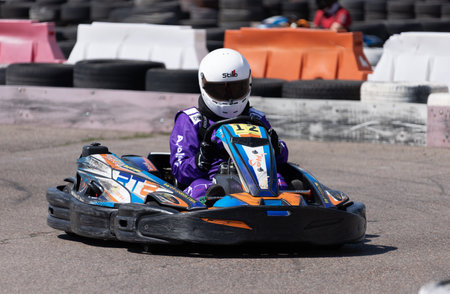 ODESSA, UKRAINE - August 7,2022: Extreme car racing. healthy lifestyle. Tense moments of race. People are into motorsports. Karting. Hobbies, sport, recreation, lifestyle. Risk and excitement on courtのeditorial素材