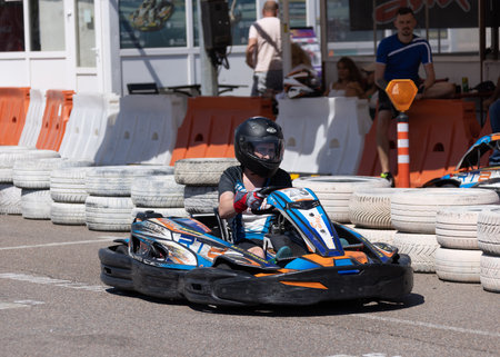 ODESSA, UKRAINE - August 7,2022: Extreme car racing. healthy lifestyle. Tense moments of race. People are into motorsports. Karting. Hobbies, sport, recreation, lifestyle. Risk and excitement on courtのeditorial素材