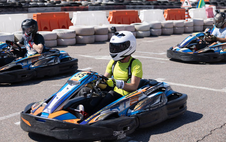 ODESSA, UKRAINE - August 7,2022: Extreme car racing. healthy lifestyle. Tense moments of race. People are into motorsports. Karting. Hobbies, sport, recreation, lifestyle. Risk and excitement on courtのeditorial素材