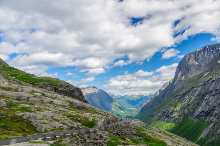 Cloudscape view on a summer valley and Trollstigen mountain road, Norwayの写真素材